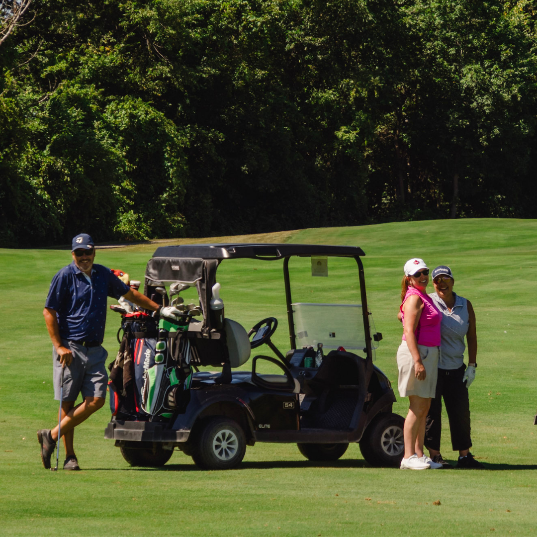 Golfers smiling on the course