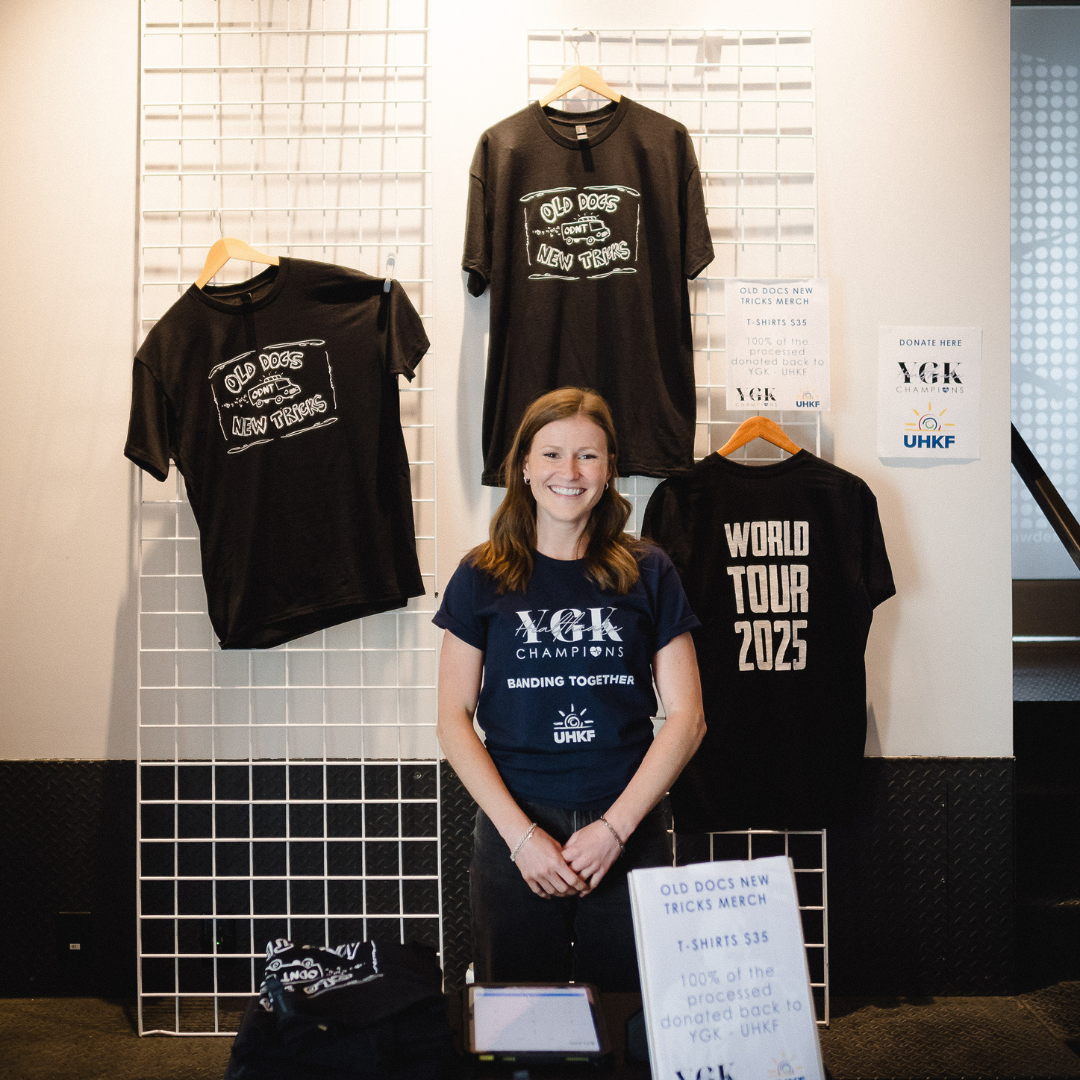 Keagan selling Old Docs New Tricks shirts.