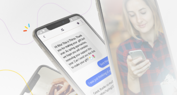 Image of donor reading a philanthropy text message.