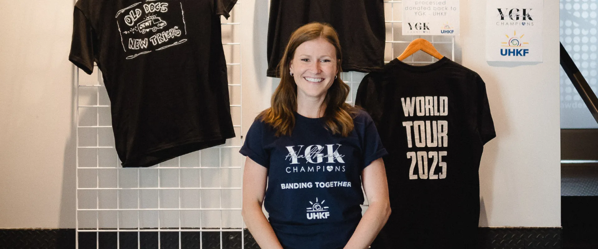 YGK Healthcare Champions Executive Committee Member, Keagan, at the Banding Together concert wearing a YGK t-shirt.