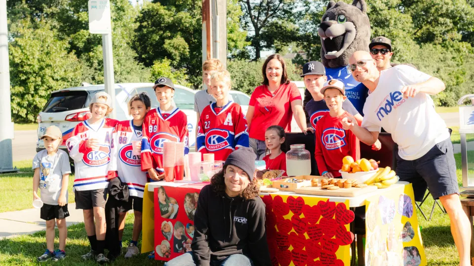 The Mending Hearts with Declyn Lemonade Stand with Asher and Move Radio hosts.