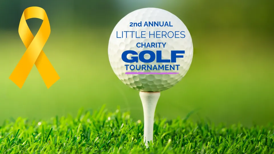 Image of a golf ball and a gold ribbon.