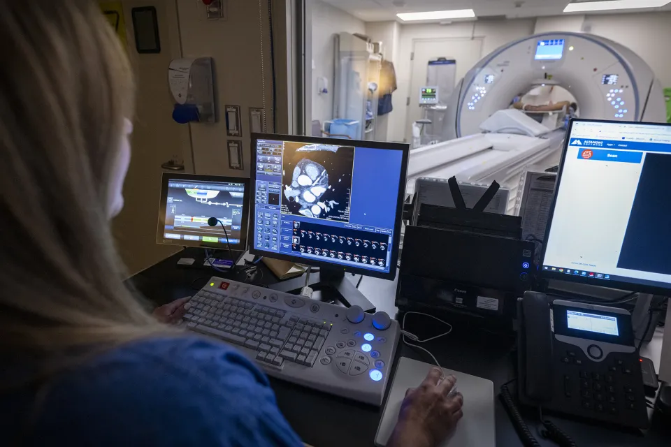 Image of the CT suite at Hotel Dieu Hospital where the team is performing a cardiac CT exam. The Heartflow app will be used to interpret those scans to determine the level of blockage that a patient has in their artery.