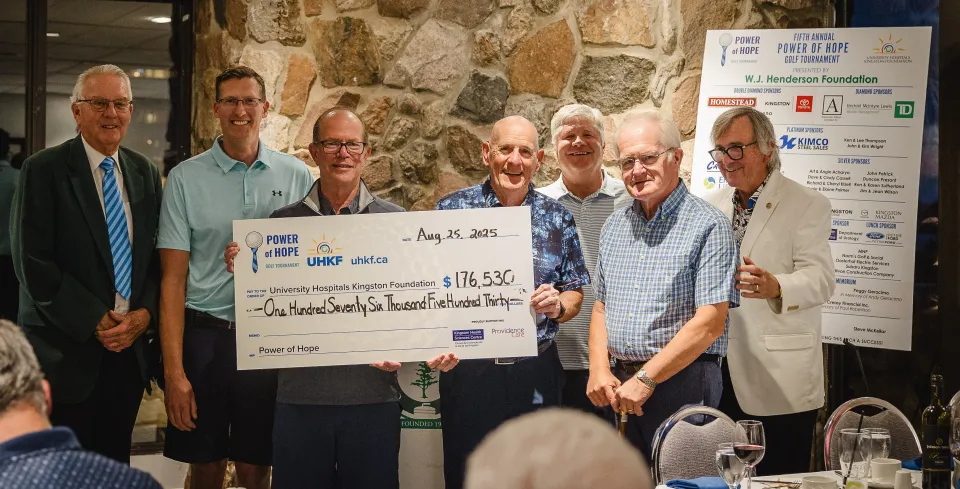 Power of Hope organizers hold fundraising cheque for $176,530 
