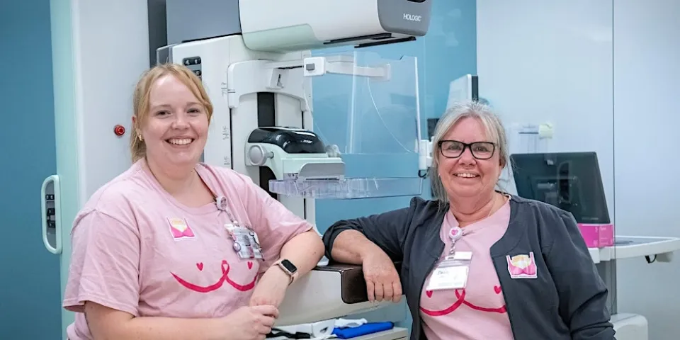 BIK staff wearing pink t-shirts.