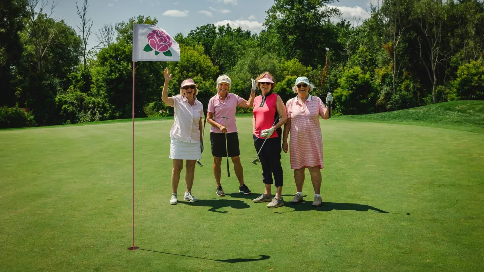 Golfers on the course at the Rose of Hope Golf Tournament.