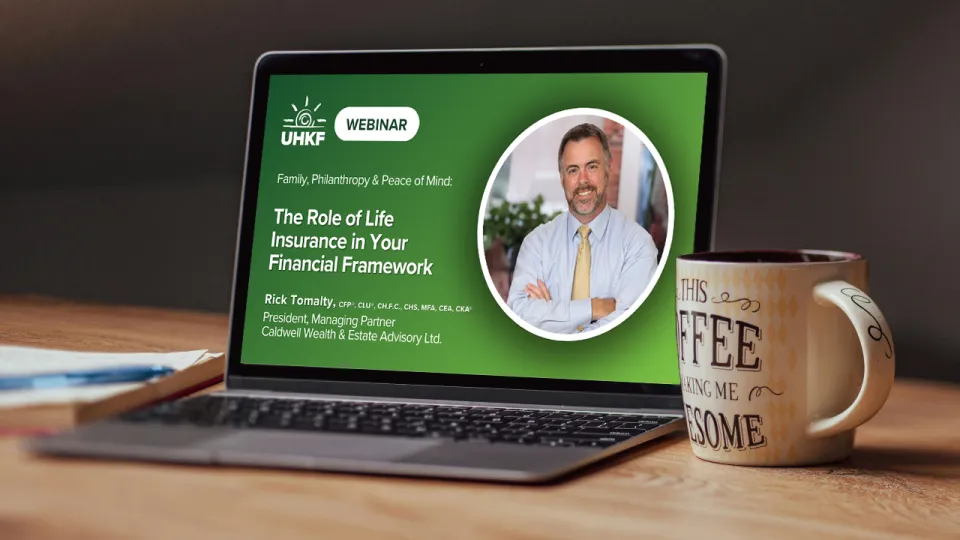 Image of a laptop screen showing a title card for a webinar.