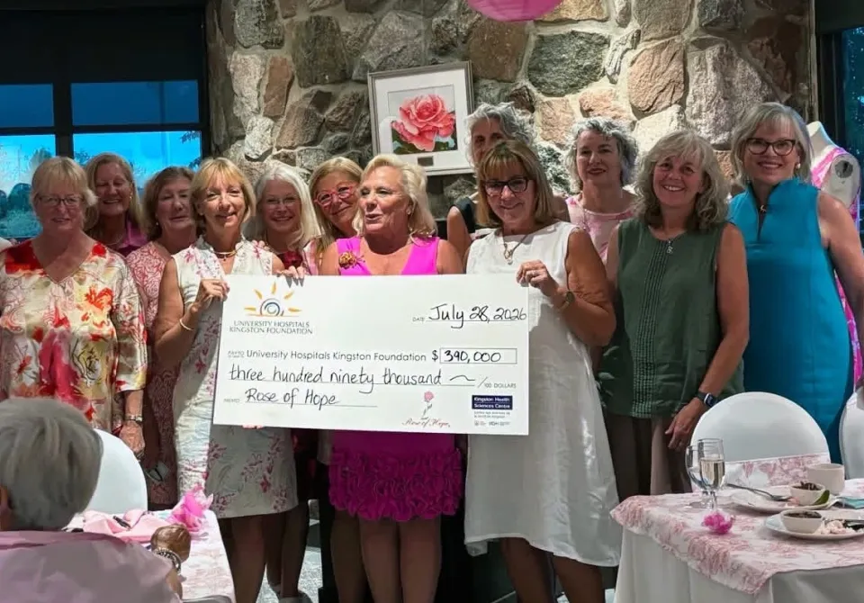 Rose of hope organizers holding a cheque for $390,000