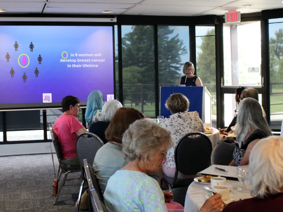 Dr. Doris Jans presenting at Women's Giving Circle luncheon.