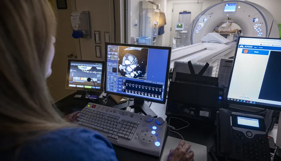 Image of the CT suite at Hotel Dieu Hospital where the team is performing a cardiac CT exam. The Heartflow app will be used to interpret those scans to determine the level of blockage that a patient has in their artery. 
