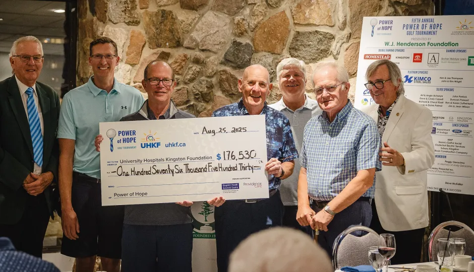 Power of Hope organizers hold fundraising cheque for $176,530 