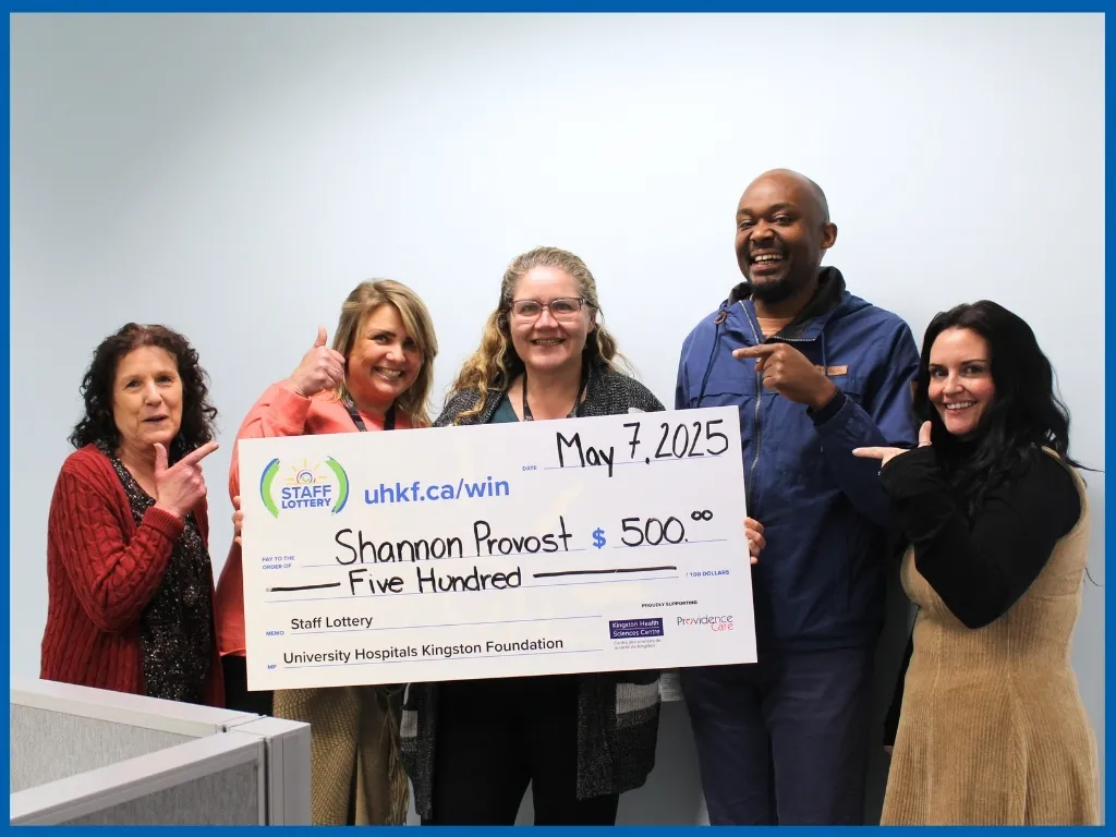 Winner Shannon Provost Holding Large Cheque