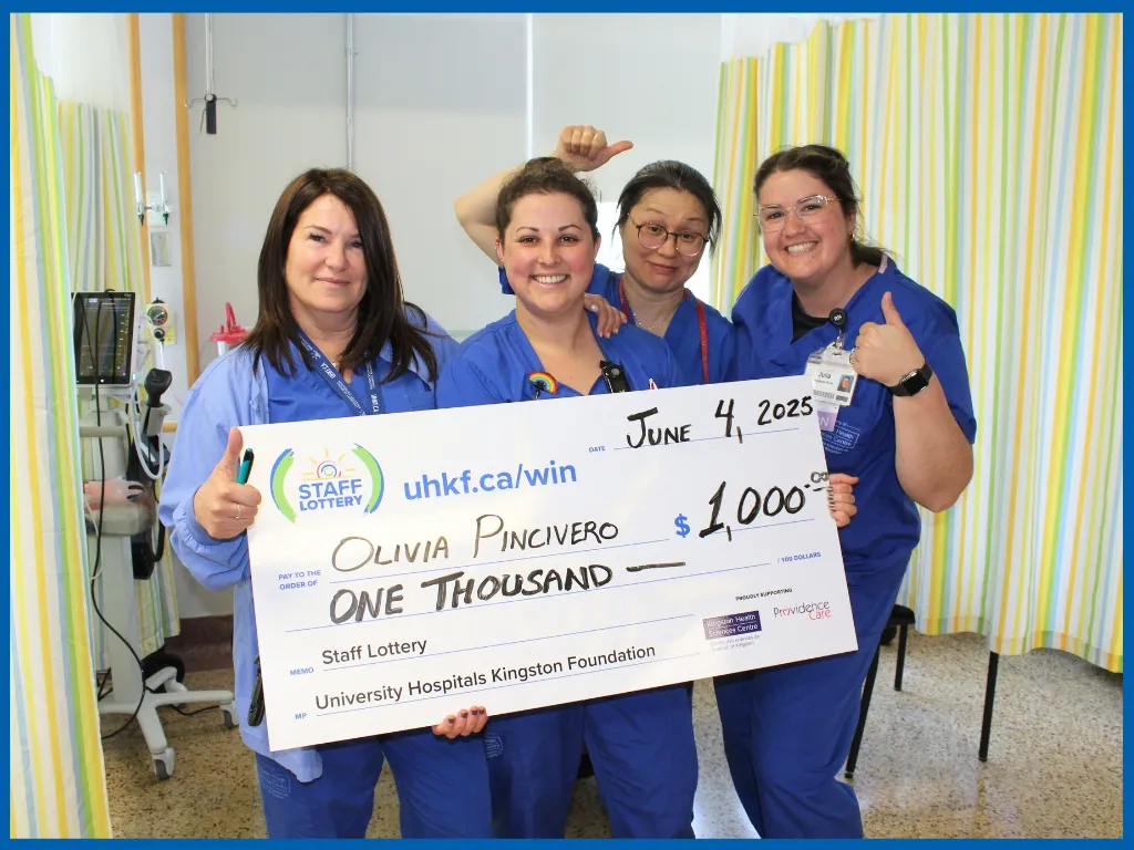 Winner Olivia Pincivero Holding Large Cheque