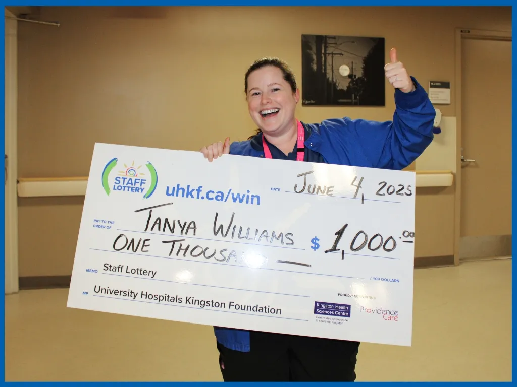Winner Tanya Williams Holding Large Cheque