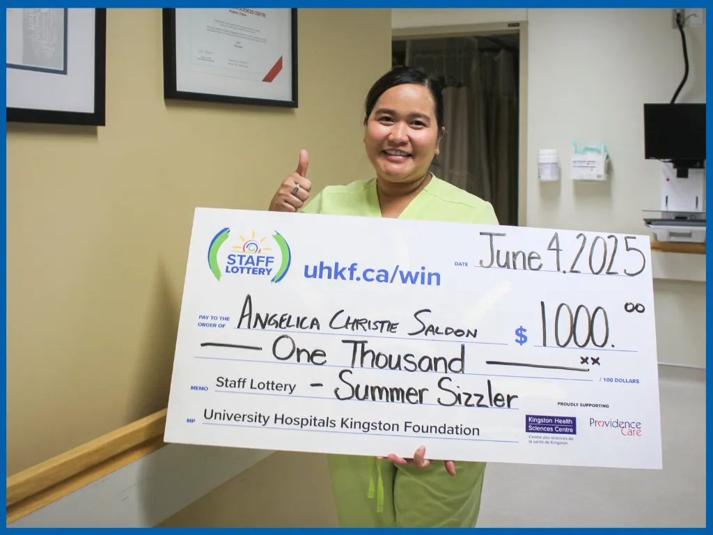 Winner Angelica Christie Saldon Holding Large Cheque