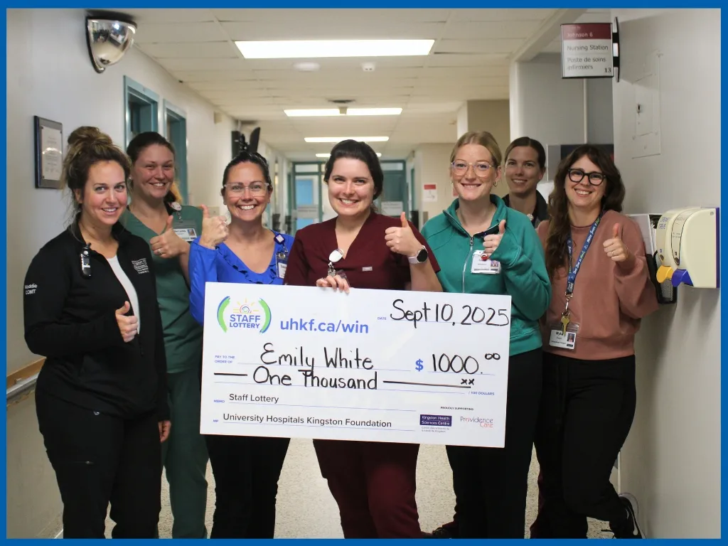  Winner Emily White Porter Holding Large Cheque