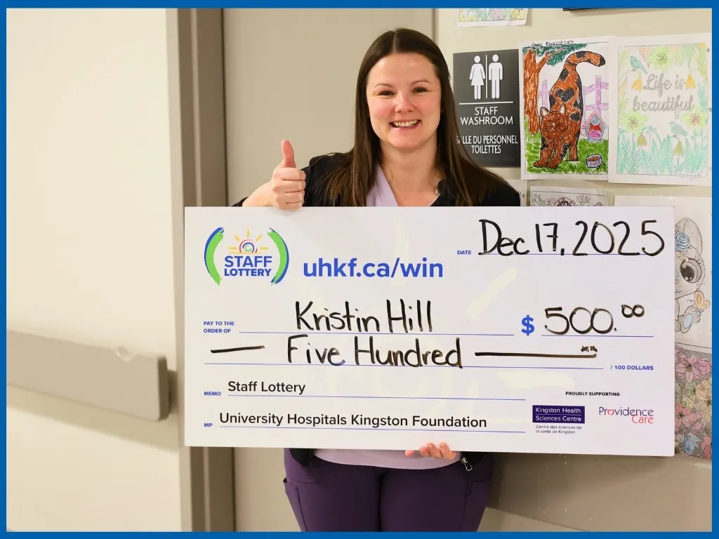 Winner Kristin Hill  Holding Large Cheque