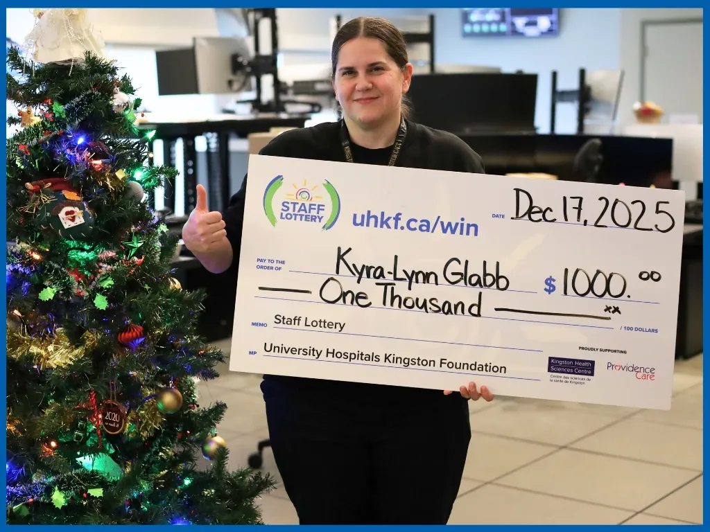 Winner Kyra-Lynn Glabb Holding Large Cheque