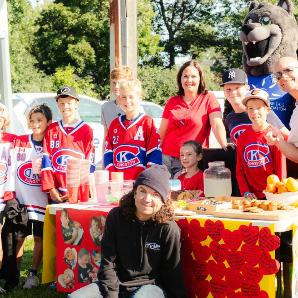 The Mending Hearts with Declyn Lemonade Stand with Asher and Move Radio hosts.