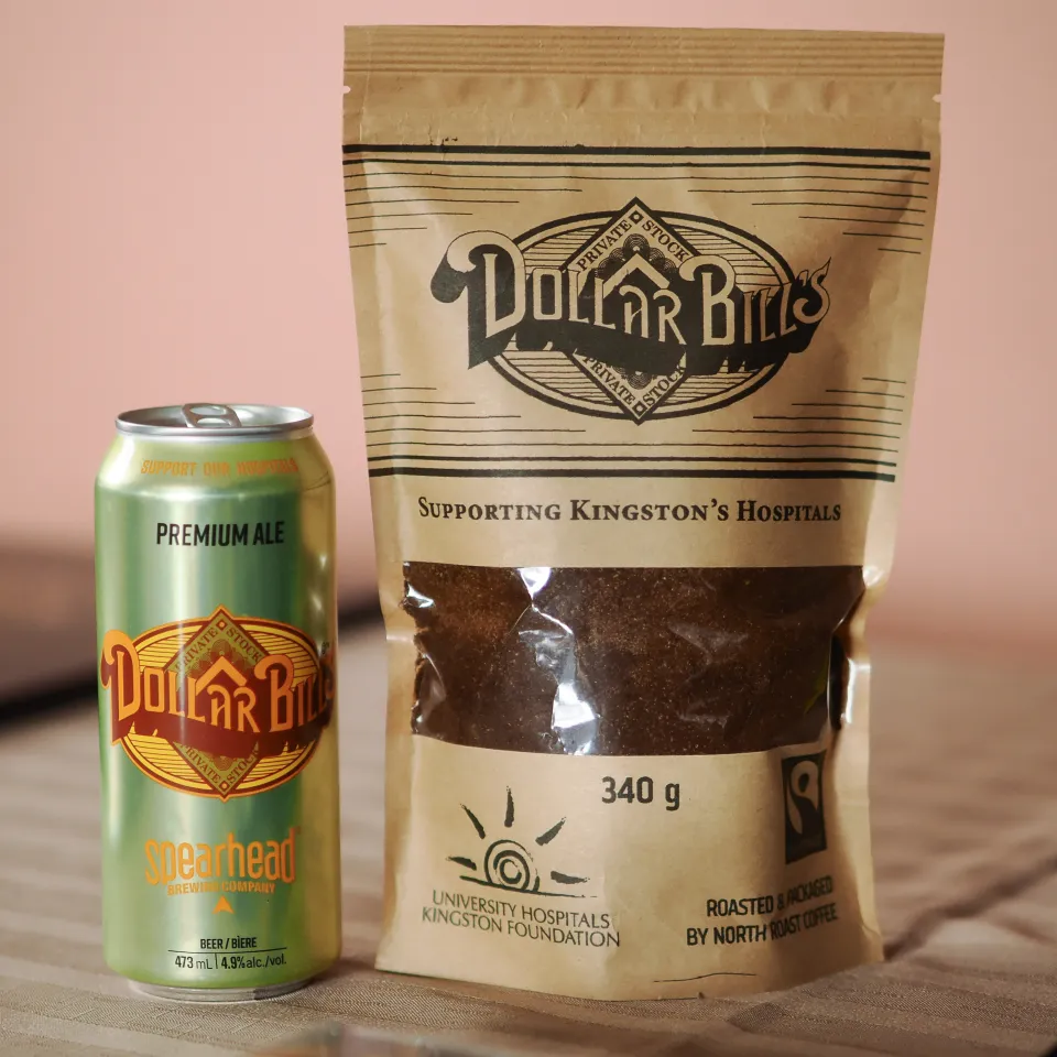 Dollar Bills coffee bag and Dollar Bills beer can on display.