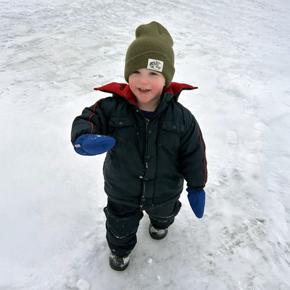 Bobby Salt playing in the snow.