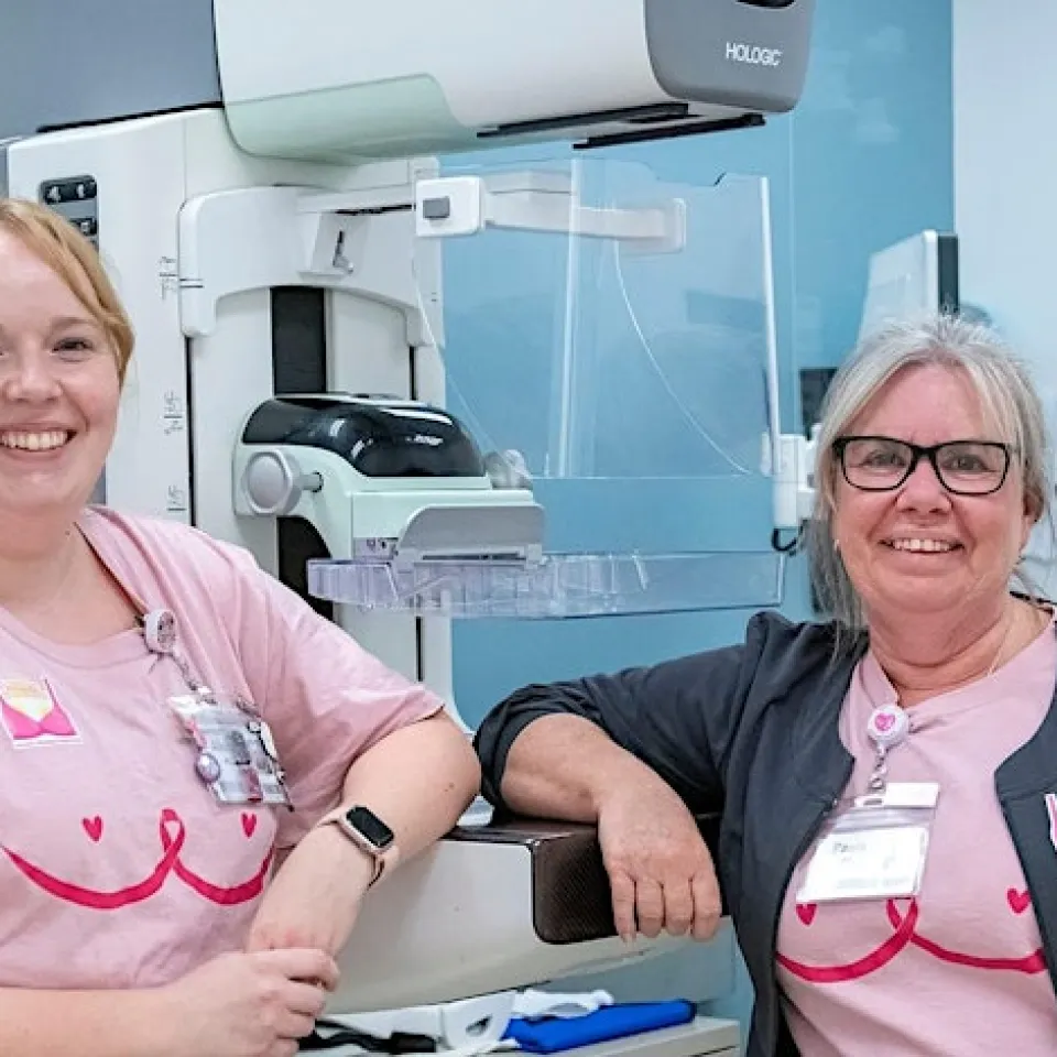 BIK staff wearing pink t-shirts.