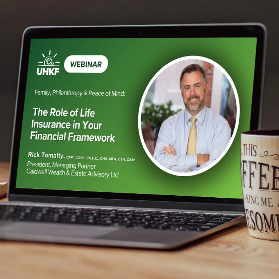 Image of a laptop screen showing a title card for a webinar.